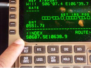 Entry of Jakarta gate coordinates into Viva Macau Boeing 767 flight management computer