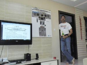 webmaster having a beer while studying a checklist